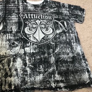Men’s affliction tee shirt.